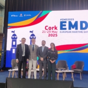 4 panellists in frnt of screen